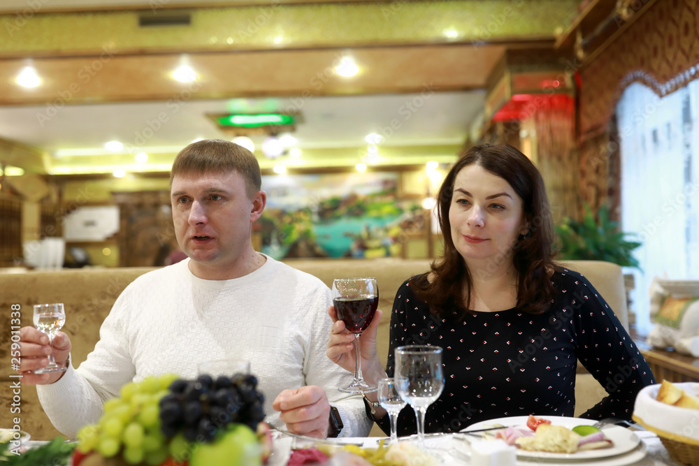 Couple celebrates holiday in restaurant