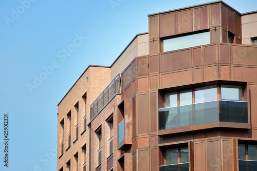 Fragment of a modern apartment building in front. Very modern apartment house.