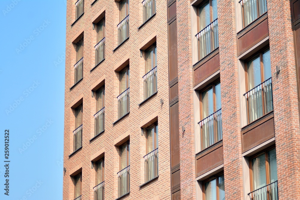 Fragment of a modern apartment building in front. Very modern apartment house. Fragment of a modern apartment building in front. Very modern apartment house.