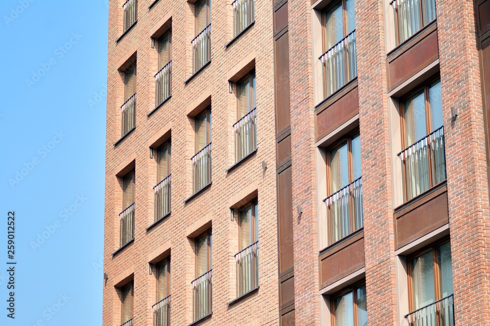 Fragment of a modern apartment building in front. Very modern apartment house.