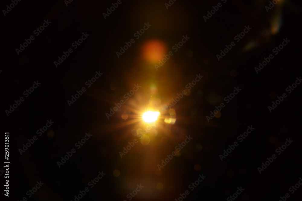 Abstract Natural Sun flare on the black background. Abstract Natural Sun flare on the black background.