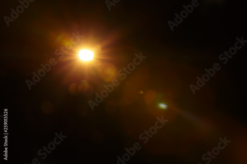 Photo Abstract Natural Sun flare on the black background.