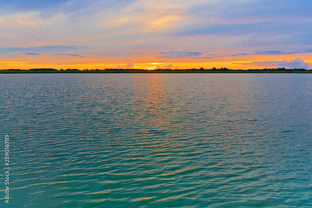 Lake in the summer at sunset. Kostroma, Russia. Lake in the summer at sunset. Kostroma, Russia.