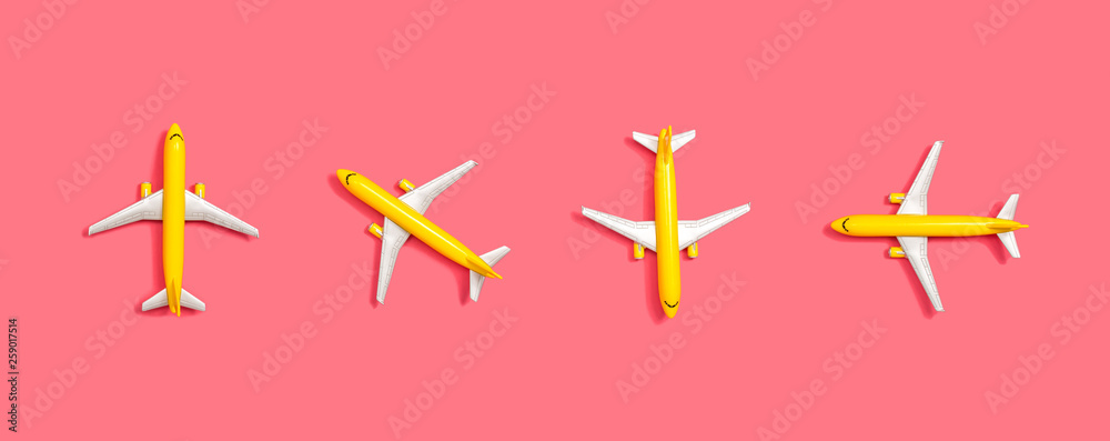 Fototapeta Toy miniature airplanes overhead view flat lay