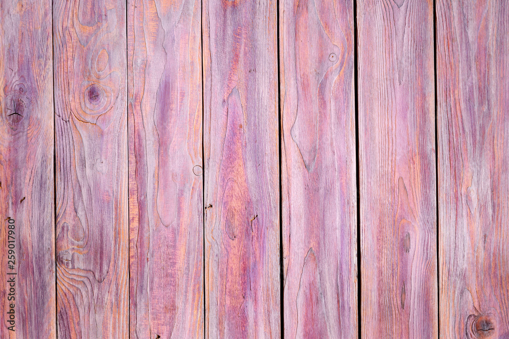 Fototapeta premium The motley wooden background