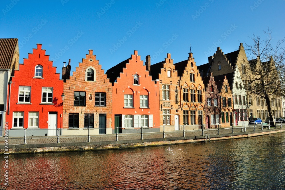 Colorful medieval houses along the Potterierei street and Langerei canal in Brugge (Bruges), Belgium
