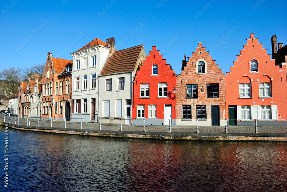 Colorful medieval houses along the Potterierei street and Langerei canal in Brugge (Bruges), Belgium