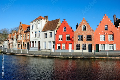 Colorful medieval houses along the Potterierei street and Langerei canal in Brugge (Bruges), Belgium