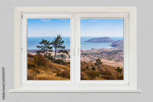 View from the window mountain landscape with the sea