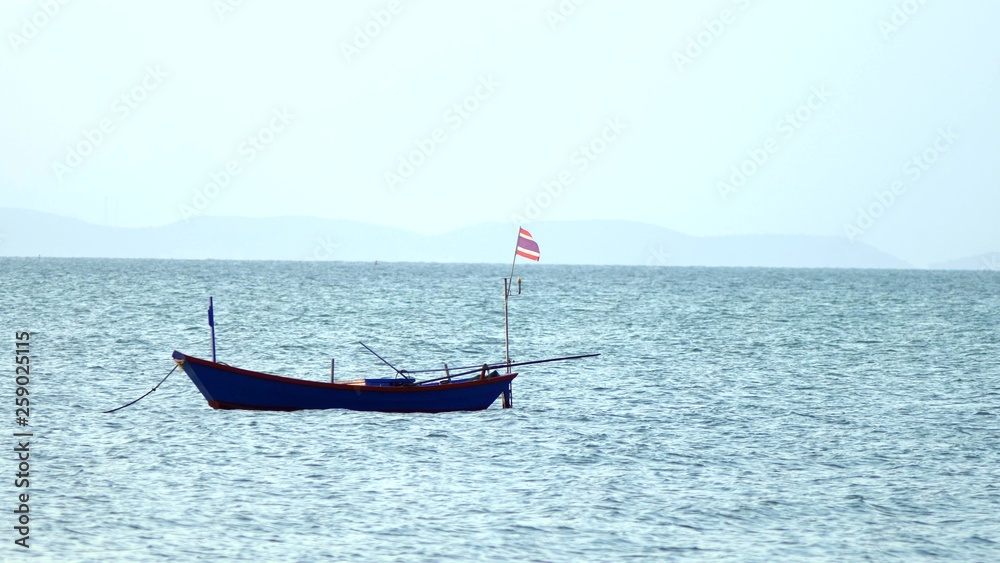 traditional Thai longtail boat in the sea.