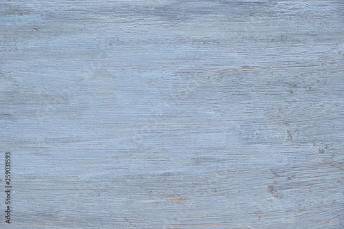 Light grey-violet wooden texture with crackled paint. Aged wood surface, copy-space