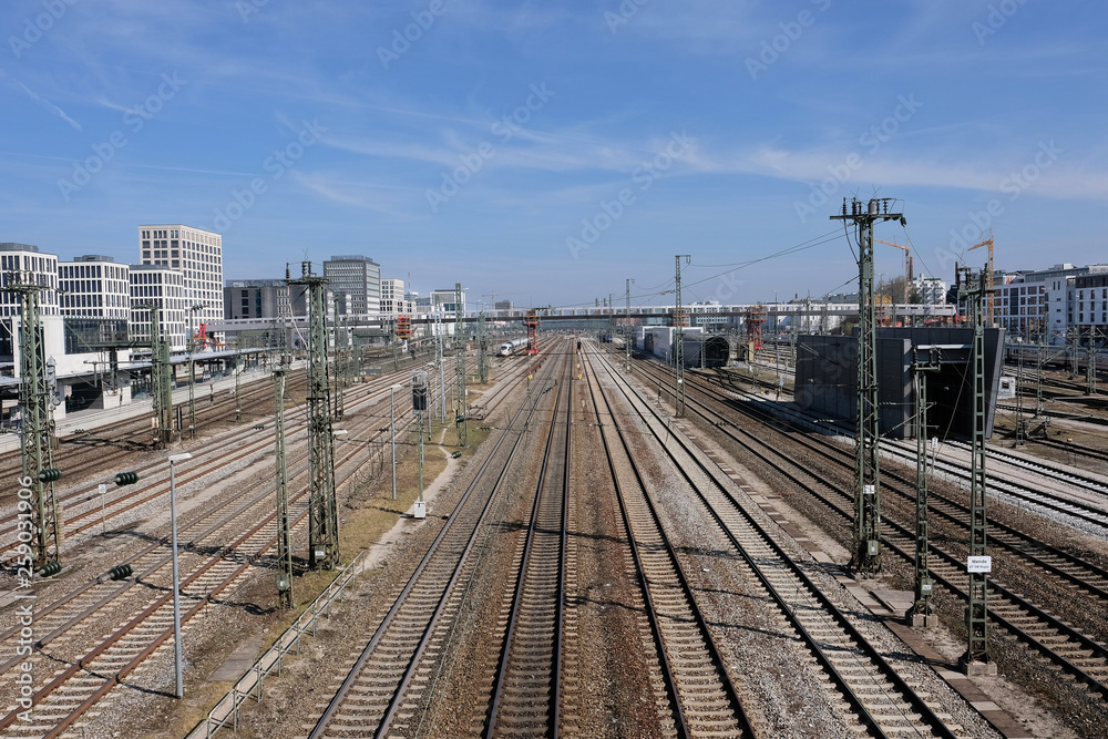 View towards main station in Munich with trails and power supply lines
