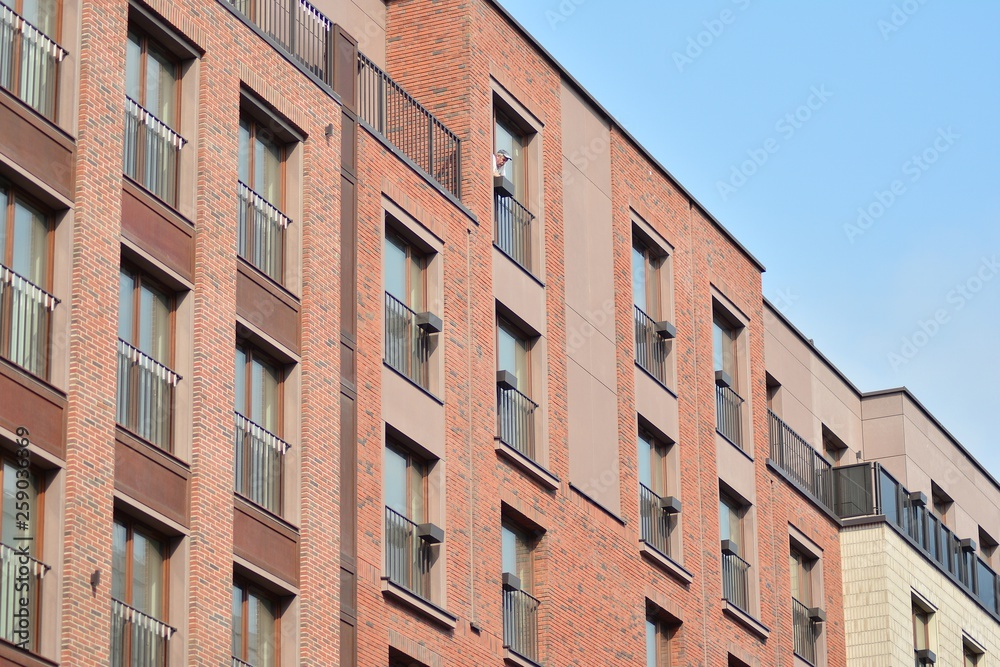 Fragment of a modern apartment building in front. Very modern apartment house. Fragment of a modern apartment building in front. Very modern apartment house.