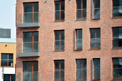 Fragment of a modern apartment building in front. Very modern apartment house.