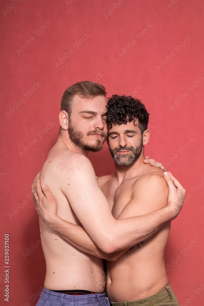 calm and serene, two men gay couple posing to camera shirtless. calm and serene, two men gay couple posing to camera shirtless.