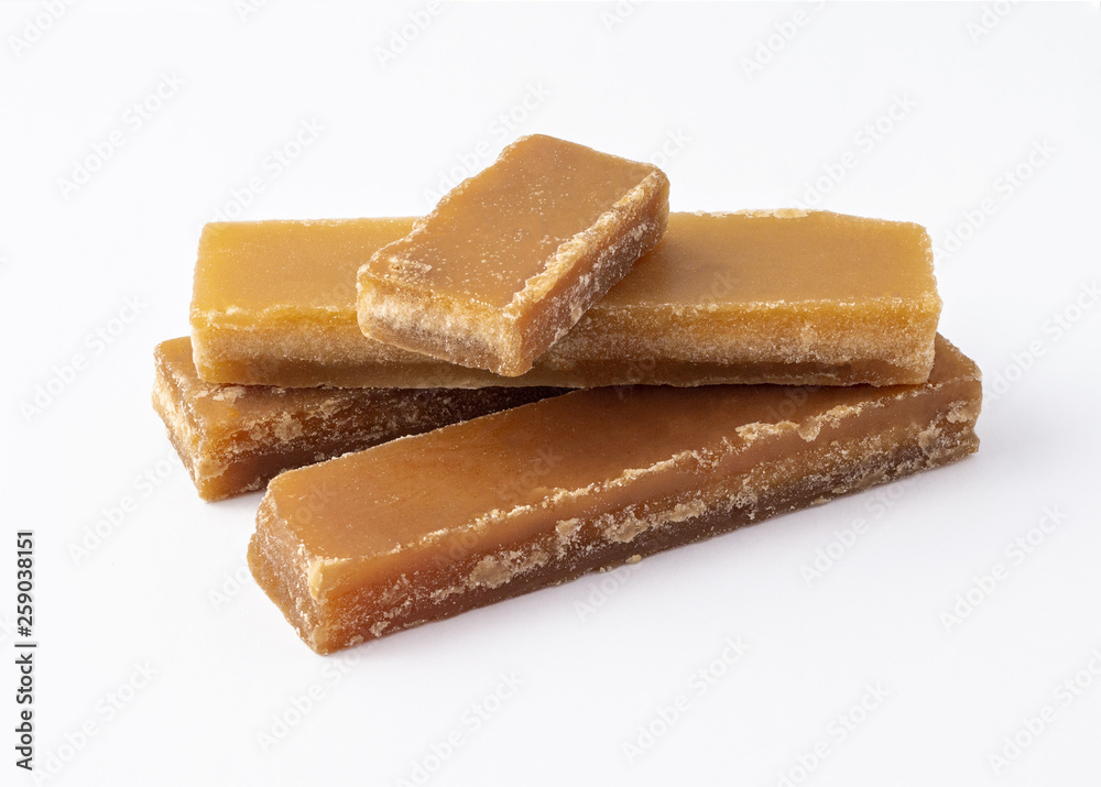 brown sugar bar on white background.. brown sugar bar on white background..
