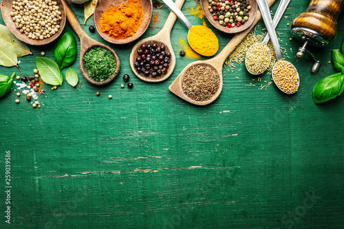 Fototapeta Naklejka Na Ścianę i Meble -  Spices and herbs on wooden background