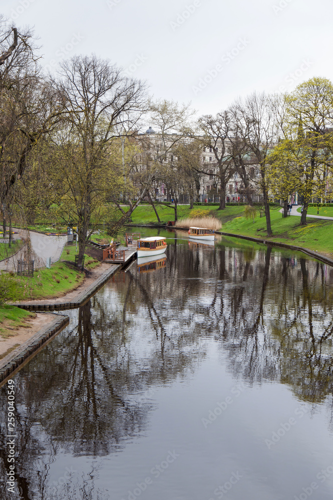 Passenger boats on the river in the city of Riga Passenger boats on the river in the city of Riga