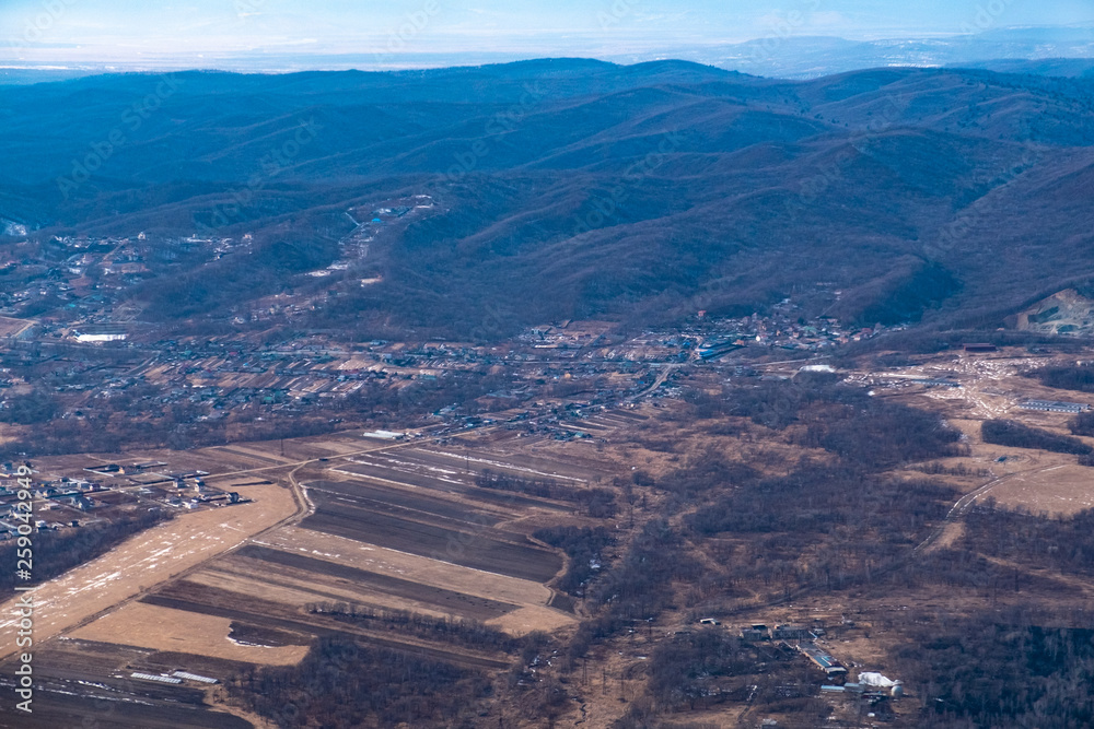 View from the plane on the outskirts of the city of Artem. Primorsky Krai.