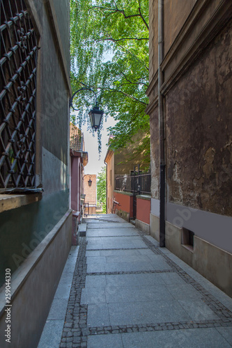 Narrow streets of Warsaw with old lanterns