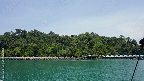 Floating hotel houses and blue sky in Thailand