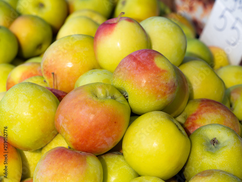 Lots of fresh green red apples.