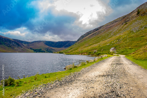 Hiking trail in Cairngorms National Park. Path around Loch Lee. Angus, Scotland, UK