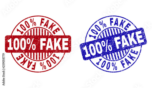 Grunge 100% FAKE round stamp seals isolated on a white background. Round seals with distress texture in red and blue colors. Vector rubber overlay of 100% FAKE text inside circle form with stripes.