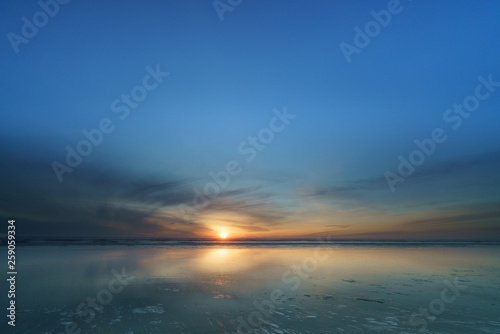 Fototapeta Naklejka Na Ścianę i Meble -  March Sunset Pacific Ocean