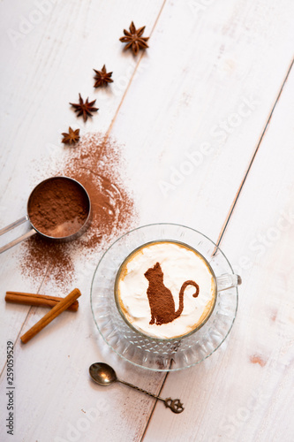 cat mark decorated on cup of hot chocolate