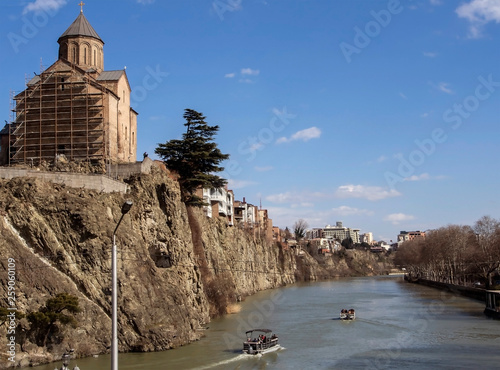 Metekhi temple on the Bank of Kura in Tbilisi photo