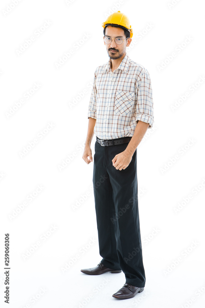 Engineer man standing yellow helmet Engineer man standing yellow helmet