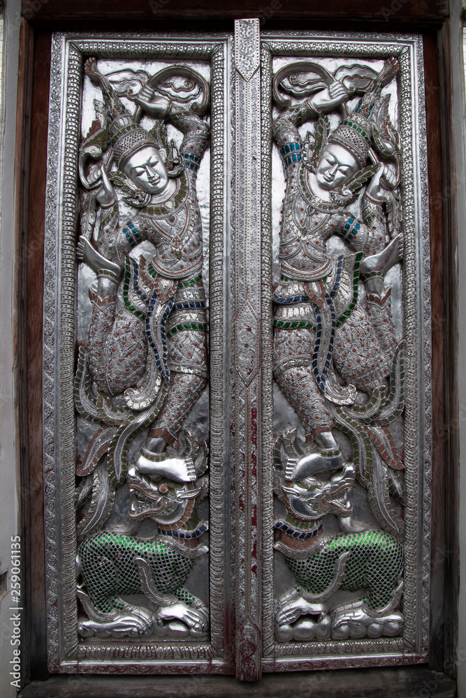 Chiang Mai Thailand, carved silver doors in lanna style