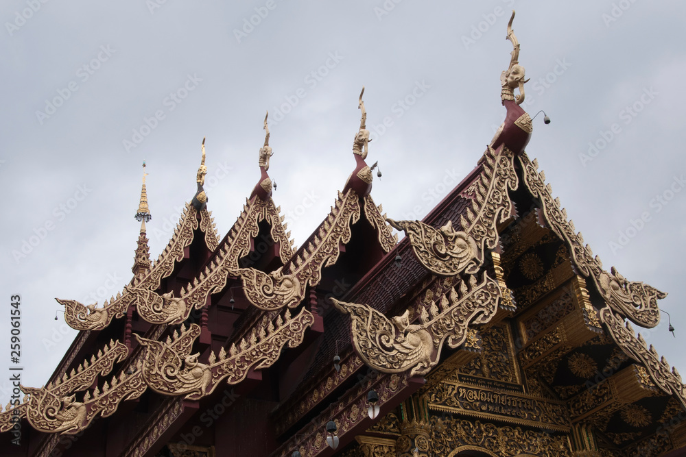 Chiang Mai Thailand, carved rooftop detail at Wat Saen Muang Ma Luang Chiang Mai Thailand, carved rooftop detail at Wat Saen Muang Ma Luang