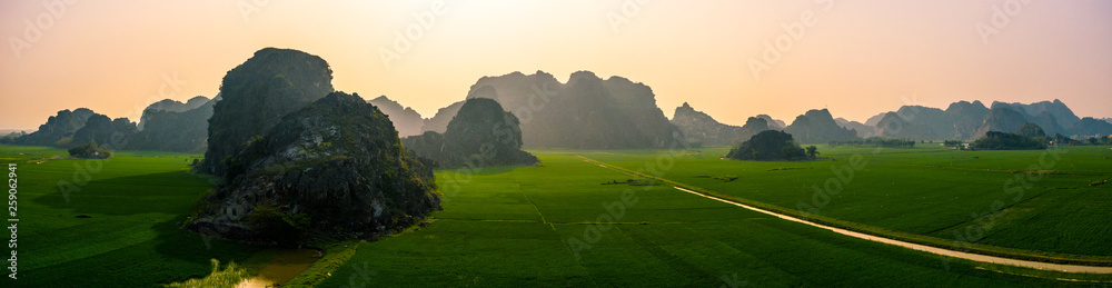 Aerial drone photo - Mountains and rice fields of North Vietnam at sunset.