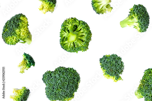 Broccoli Vegetable Pattern. Summer abstract background. Broccoli isolated on the white background,