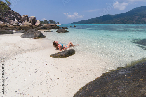 woman on an isolated beach in Andaman sea, Koh Lipe - solo travel