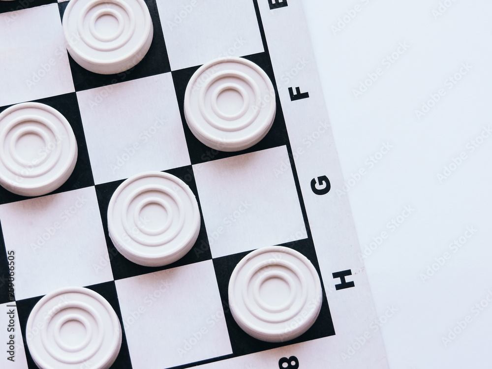 Checkerboard with checkers. Business strategy competition, strategic