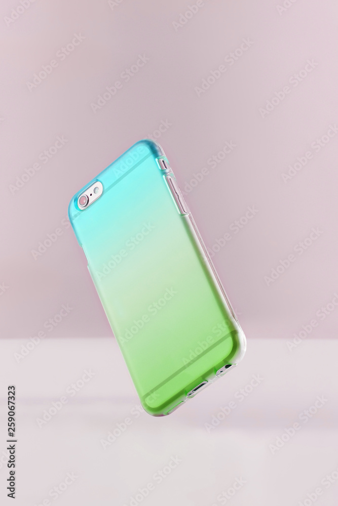 Cell phone and jelly color gradient phone case. Cell phone and jelly color gradient phone case.