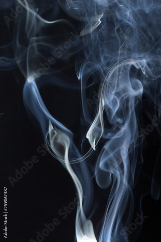 Abstract white smoke on black background