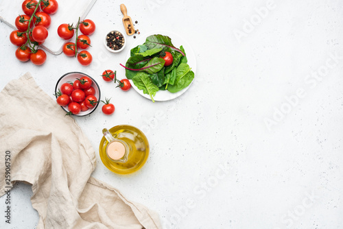 Italian cuisine food ingredients, cooking fresh summer salad ingredients and spices. Copy space for text