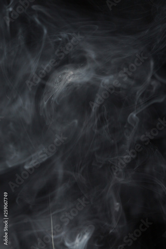 Abstract white smoke on black background