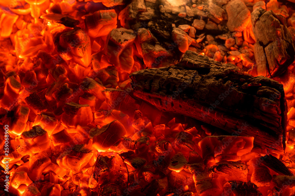 Bright sparkling coals with fire as background Bright sparkling coals with fire as background