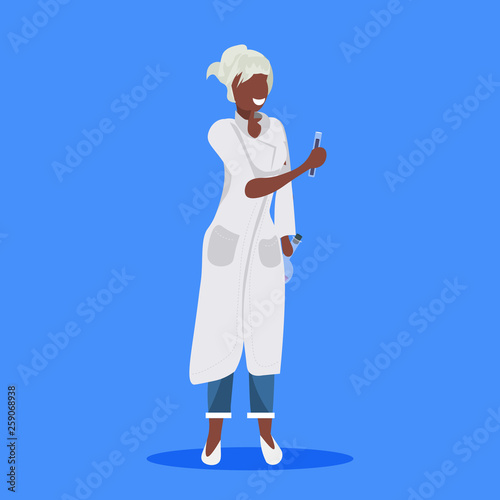 female scientist holding test tubes woman laboratory technician in white uniform african american medical worker professional occupation concept blue background flat full length