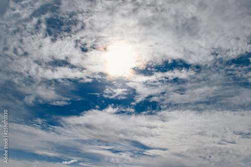 background sky clouds and sun. natural phenomena. sky, the sun shines through the clouds