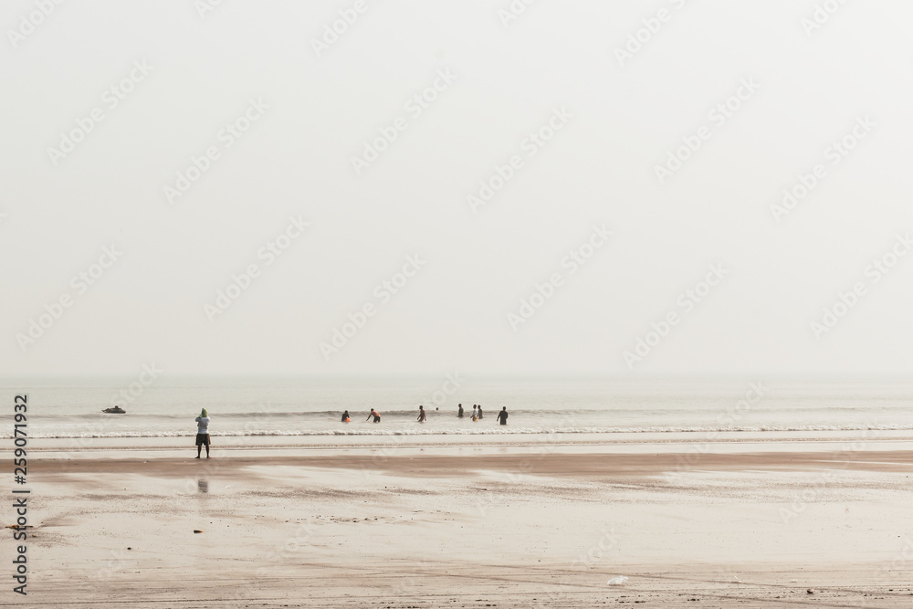 Panoramic view of Ganpatipule Sea Beach, Maharashtra. Ganpatipule has a grand shore, one of the most spectacular on Konkan coast, distinctive red sand and shallow water, making it ideal for swimming.