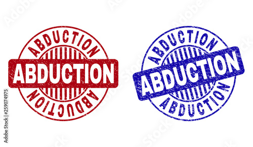 Grunge ABDUCTION round stamp seals isolated on a white background. Round seals with grunge texture in red and blue colors. Vector rubber imprint of ABDUCTION title inside circle form with stripes.