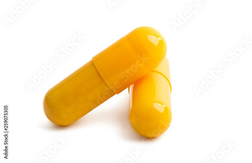 yellow capsules isolated