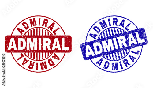 Grunge ADMIRAL round stamp seals isolated on a white background. Round seals with distress texture in red and blue colors. Vector rubber imitation of ADMIRAL title inside circle form with stripes.