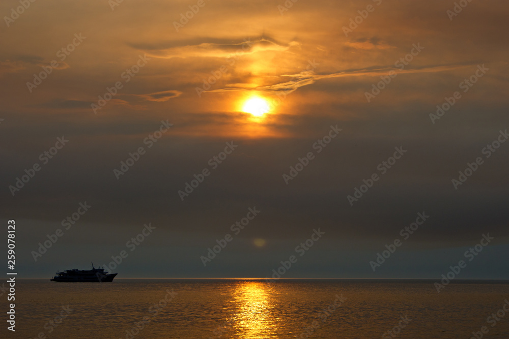 Orange summer sunset on Lake Baikal